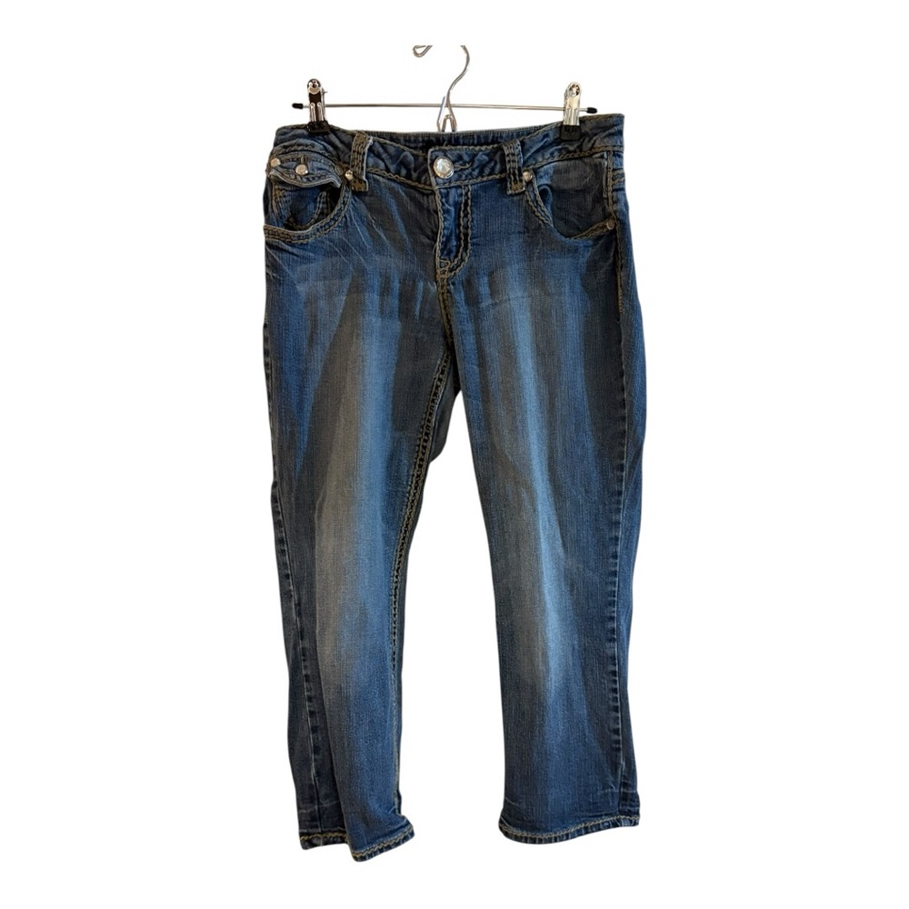 ZCO jeans embellished pockets, embroidery, rhinestones, and distressed details.